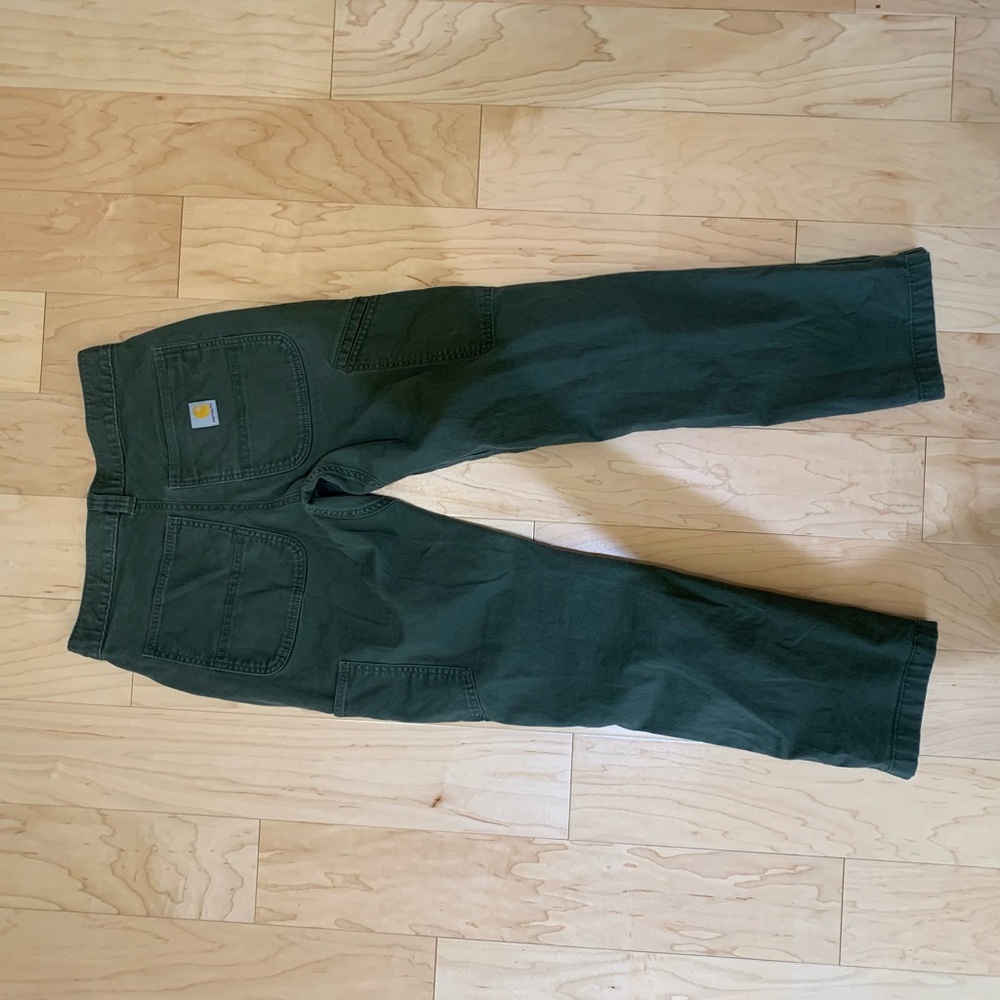 Dark green Carhartt pants. Size 31x32